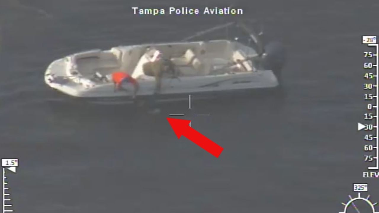 Video: Off-duty TPD officer saves man who jumped off bridge