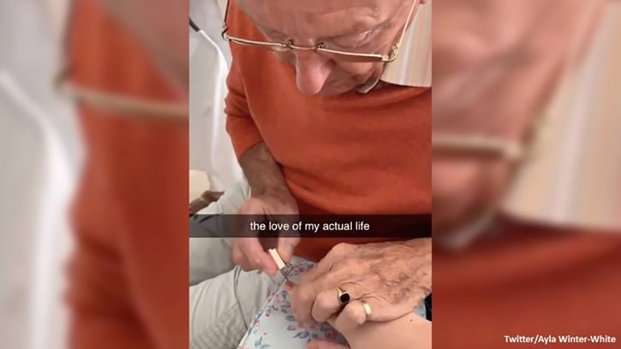 Grandfather paints granddaughter's nails after surgery