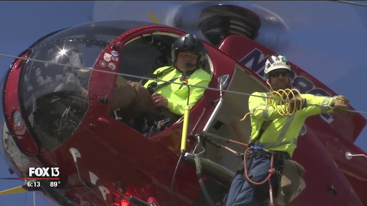 Duke crews in helicopters work to prevent outages