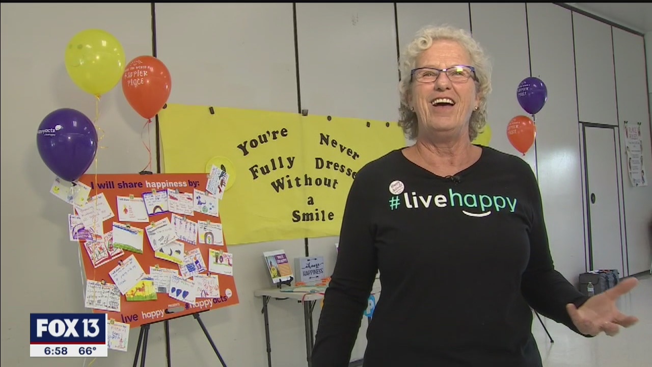 Woman awarded for happiness mission