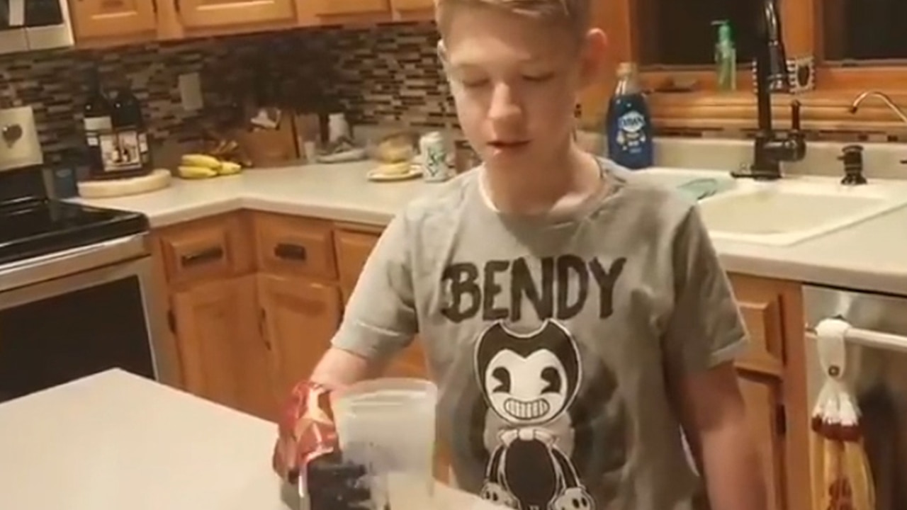 Kid uses 'hero arm' to drink water