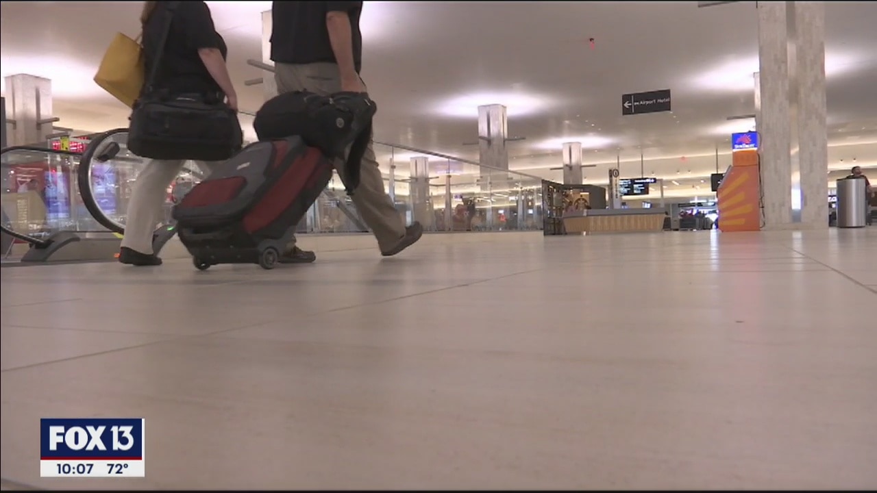 Busy travel day due to new coronavirus screening at large airports