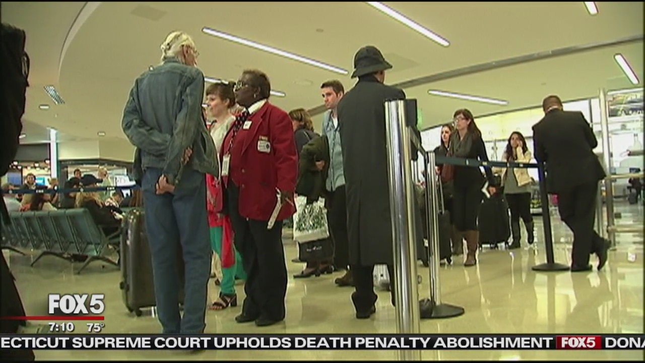 Travelers brace for long TSA screening lines