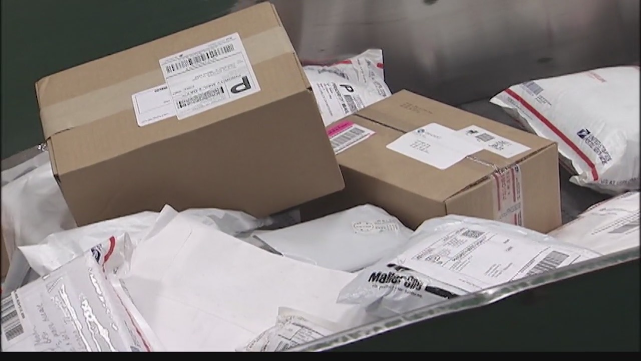 Extra postal staff working long hours to deliver 620 million items