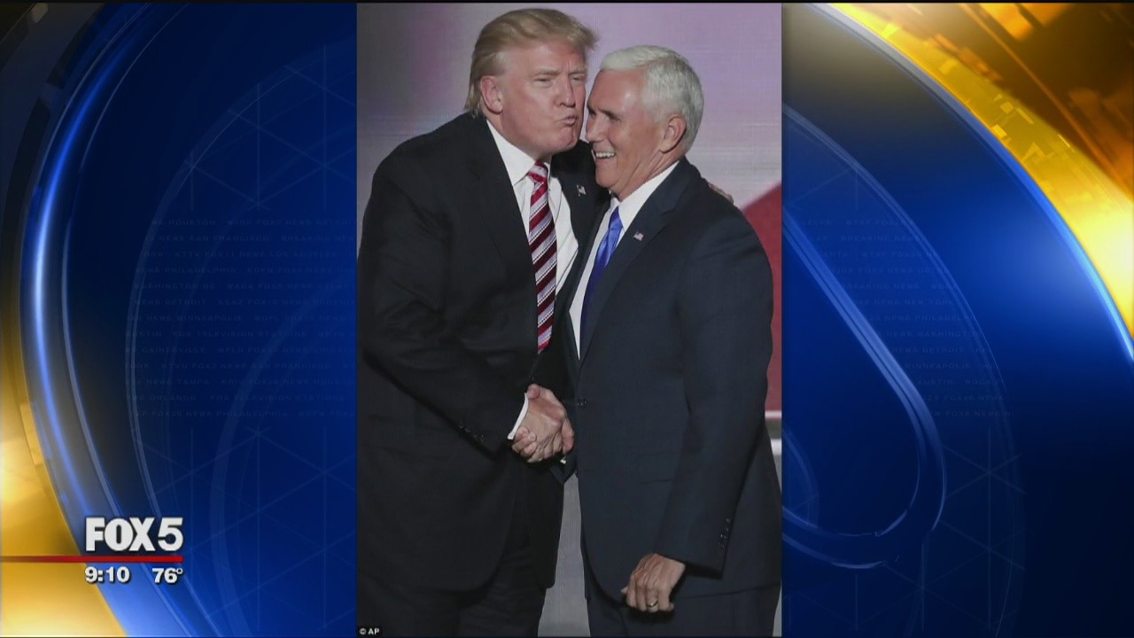 Trump air kisses Pence