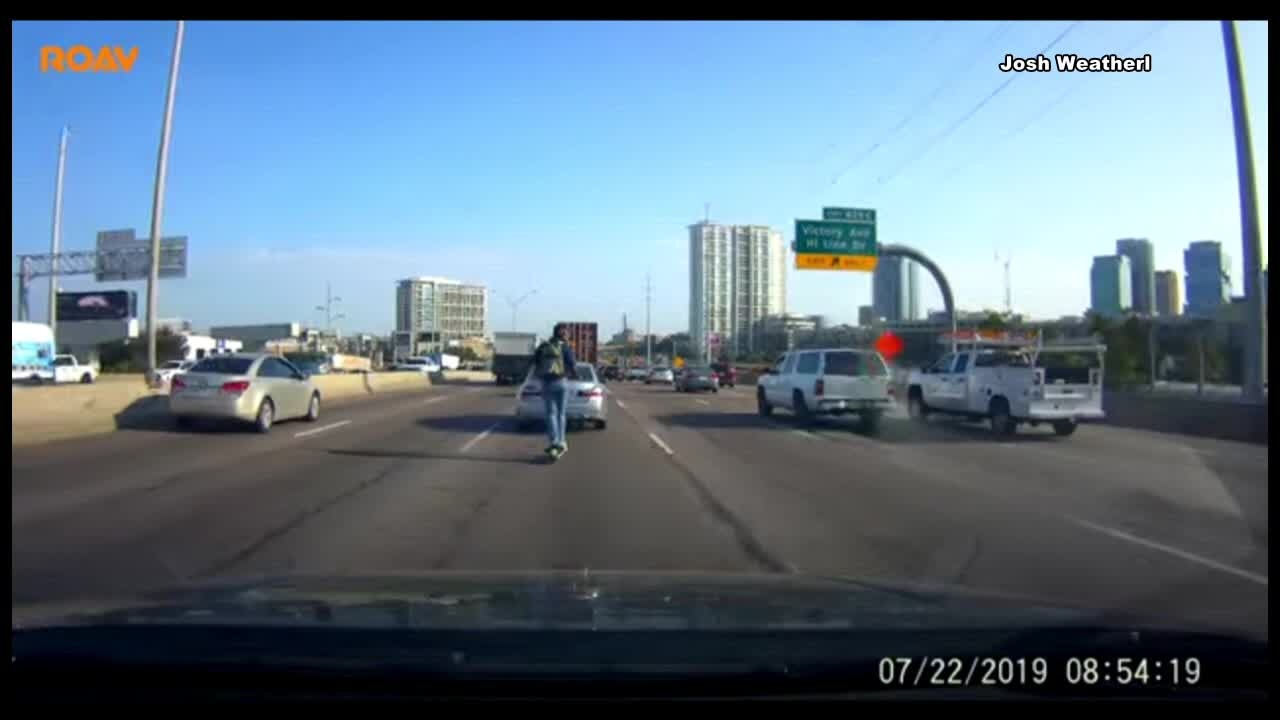 RAW: Lime scooter on I-35 in downtown Dallas rush hour traffic