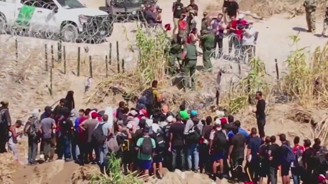 Border patrol agents struggle to keep up with migrant surge