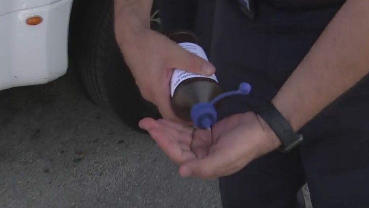 Local business supplies fire department with hand sanitizer