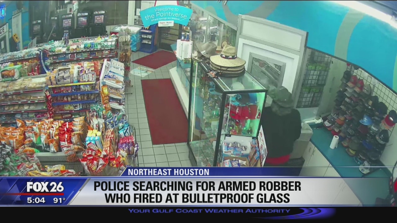Police searching for armed robber who fired at bulletproof glass