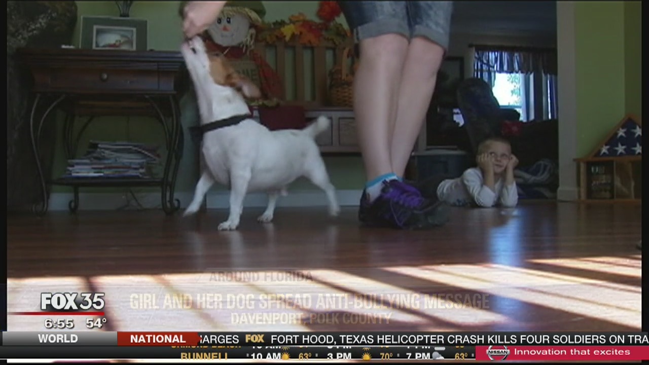 Girl and dog spread anti-bullying message