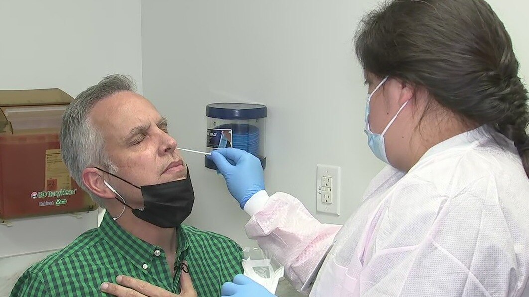 Slowing the spread of COVID-19 by getting tested