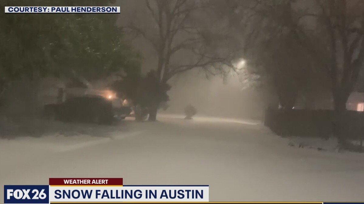 Snow falling in Austin
