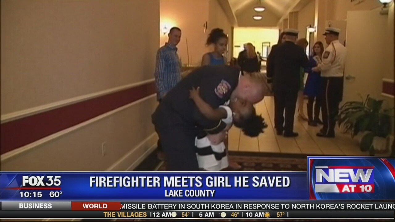 Firefighter meets girl he saved