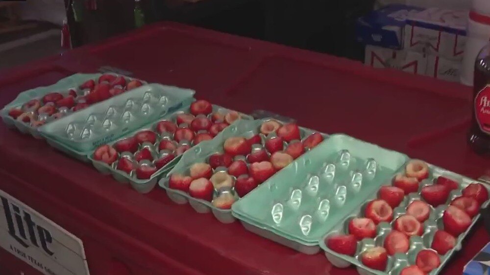 Alcohol-infused fruit being prepared for the Houston Rodeo cookoff to go along with Bar-B-Que