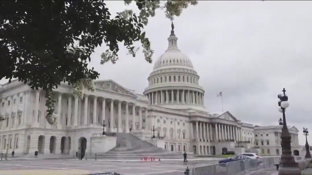 Government spending bill races to find support