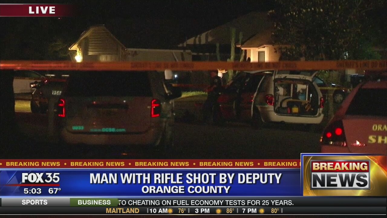 Man with rifle shot by deputy