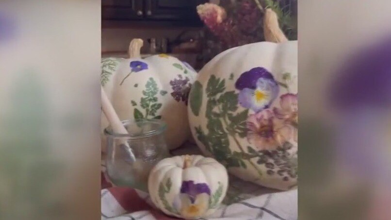 Floral-decorated pumpkins popular fall decorations