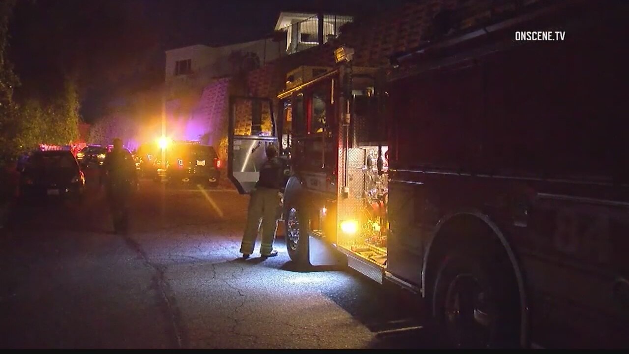 Man killed outside Woodland Hills home