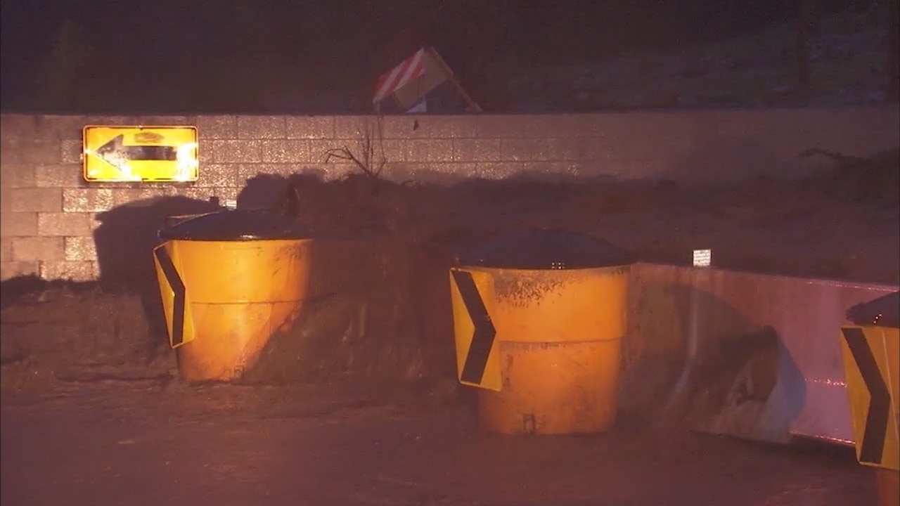 Mud Pours Over K-Rails Near Hillside Homes In Duarte