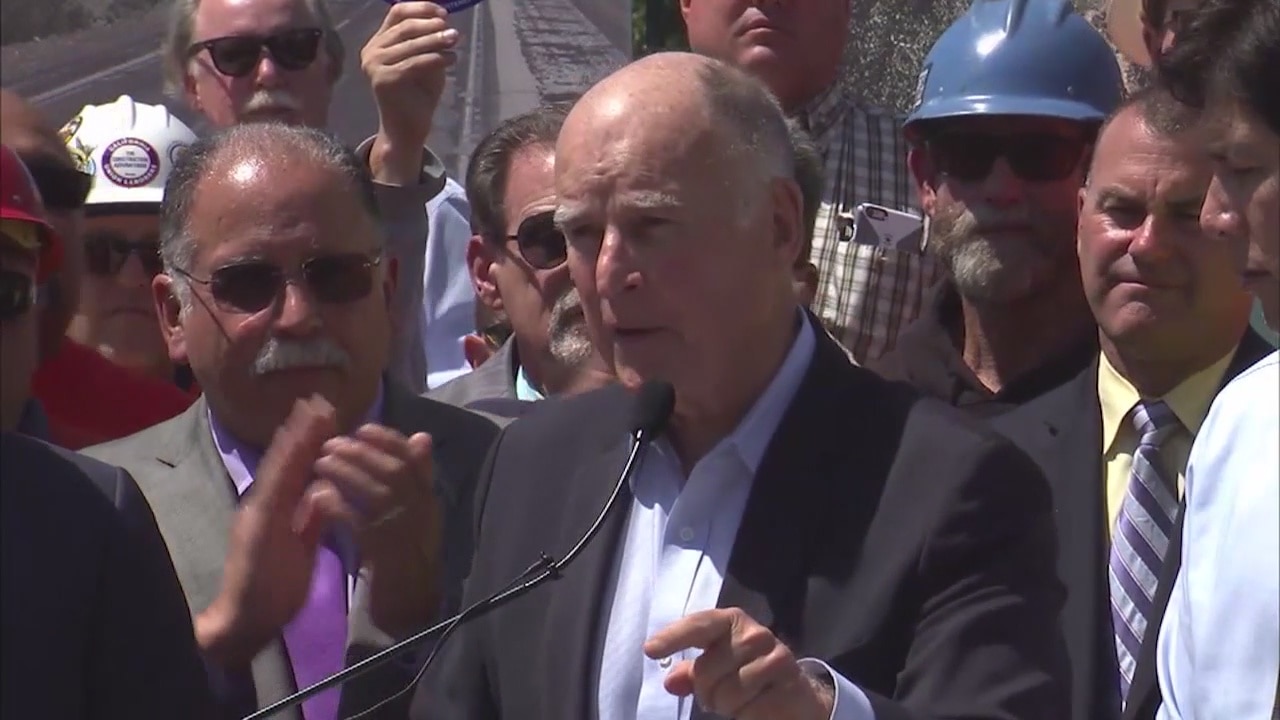 Proposed gas, vehicle tax hike to fund road repairs