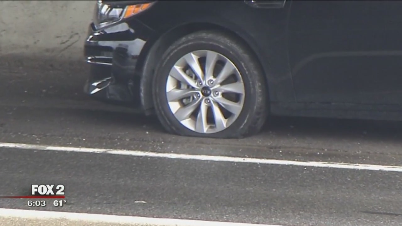 Pothole disguised by rain water leave drivers stranded | FOX 2 Detroit