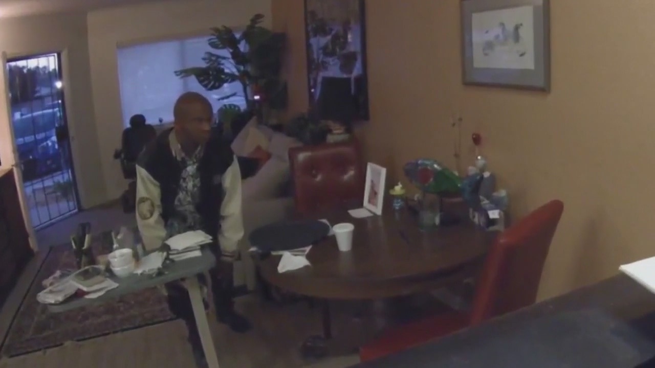 VIDEO: Burglar caught on camera with elderly woman