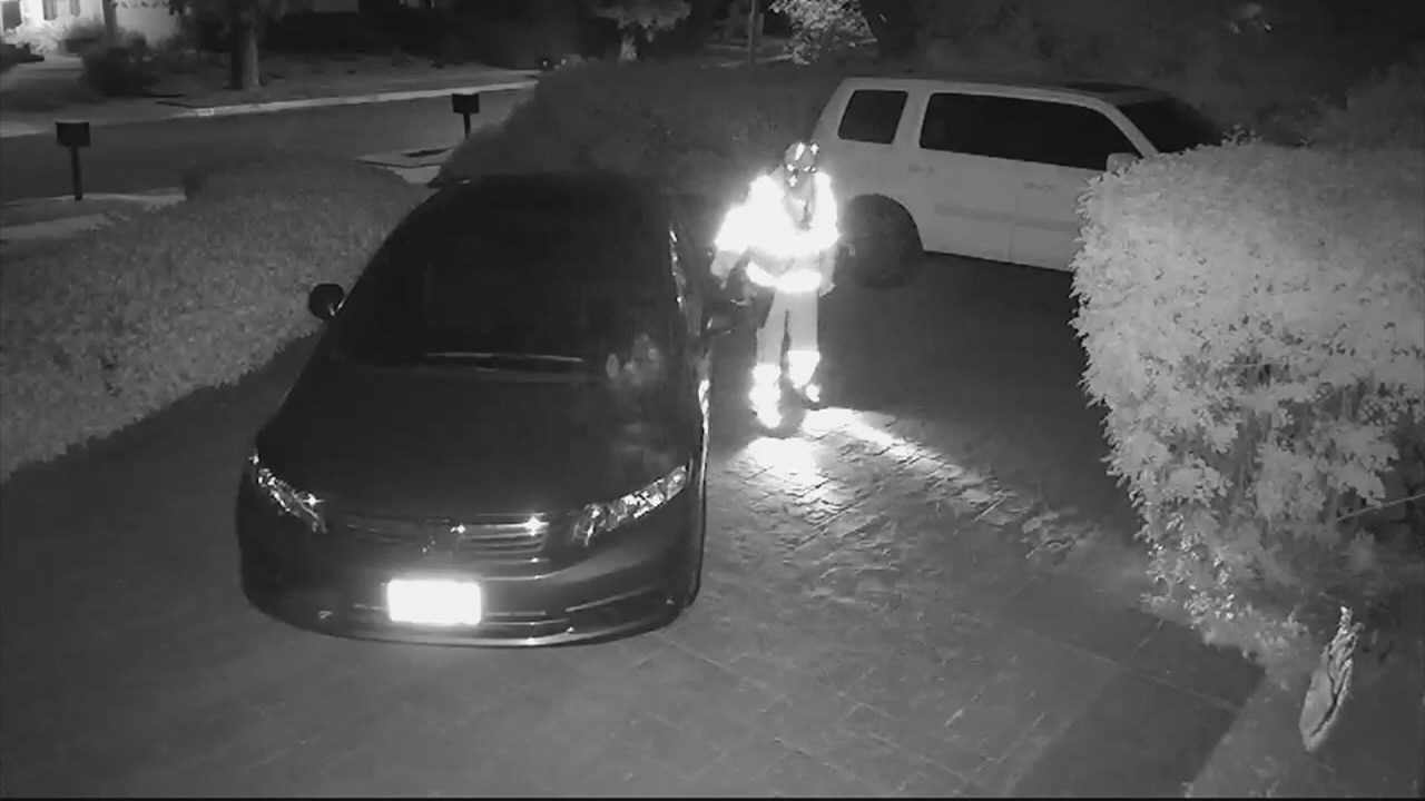 Super hero or evil villain? Video catches mystery man on a mission