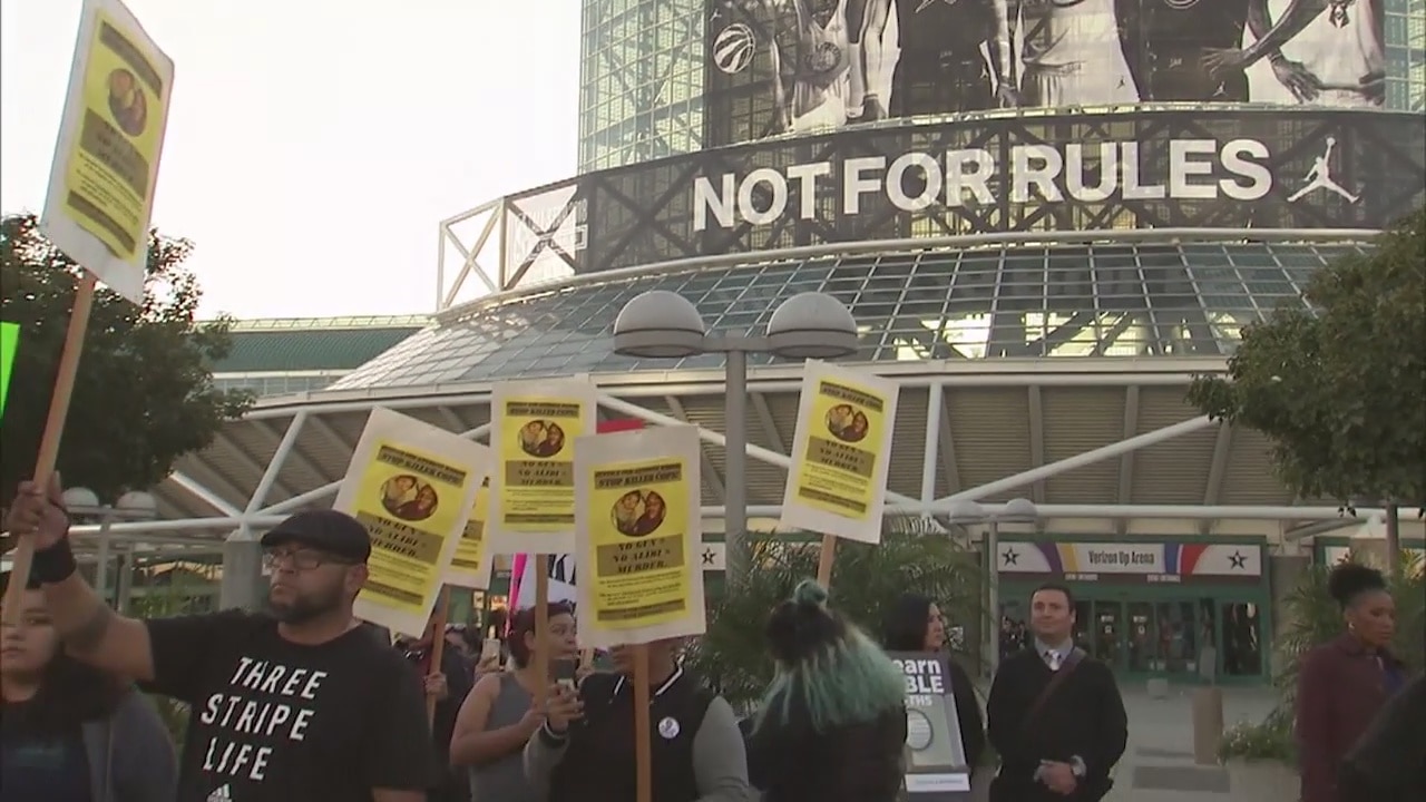 Group protests deputy involved shooting outside Staples Center