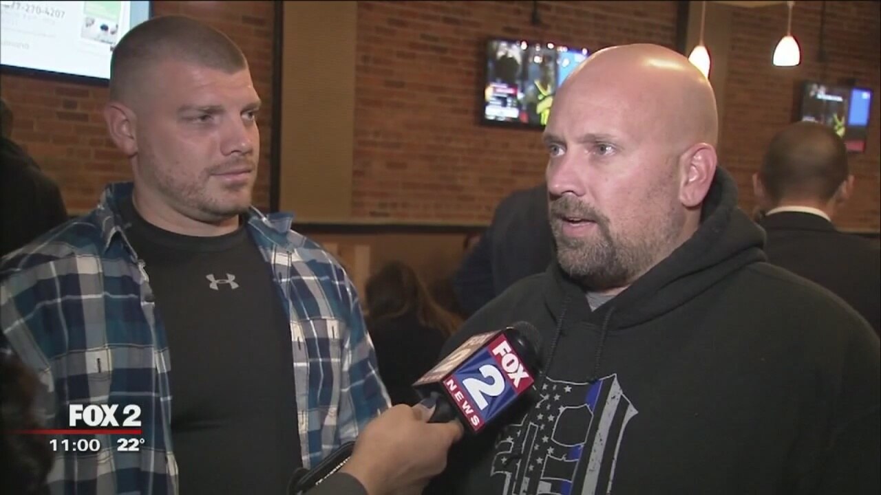 Community rallies for 2 Detroit police officers shot in the line of duty