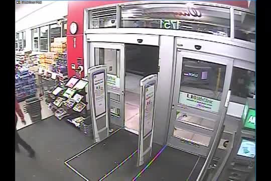 Cashier stares down armed robber