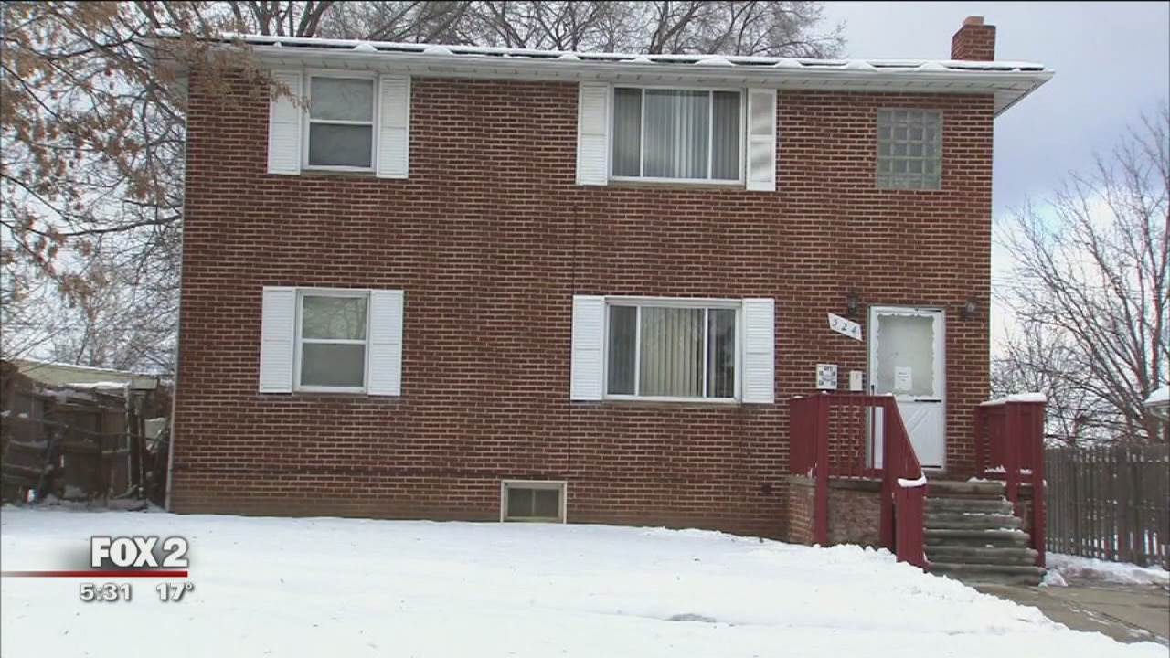 State worker, caregiver charged with covering up man's death