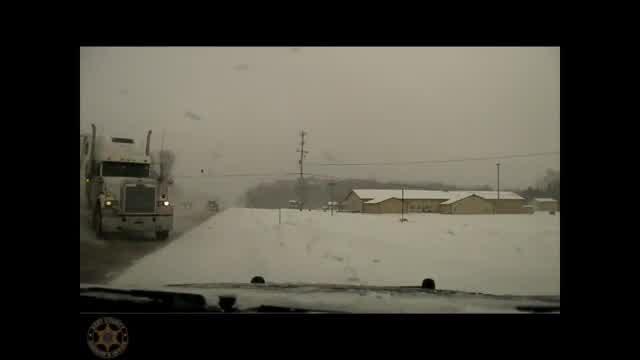 Dramatic dash cam shows deputy avoid truck collision on west side of Michigan