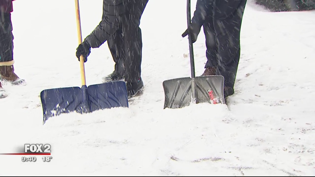 Snow shoveling techniques to save your heart