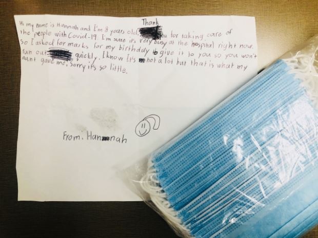 Eight year old girl donates masks