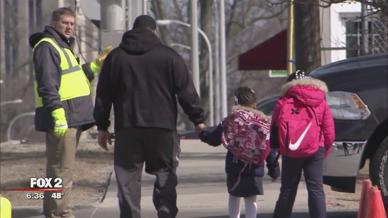 Teacher working as crossing guard still in critical condition