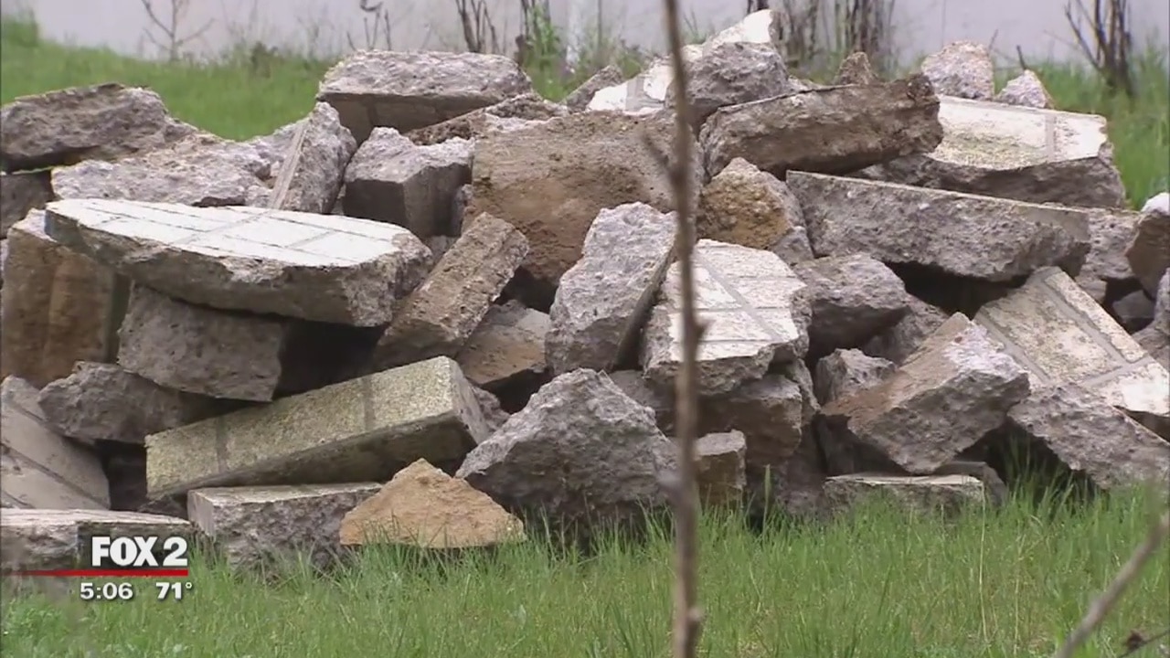 Man drops trailer full of concrete behind Redford business