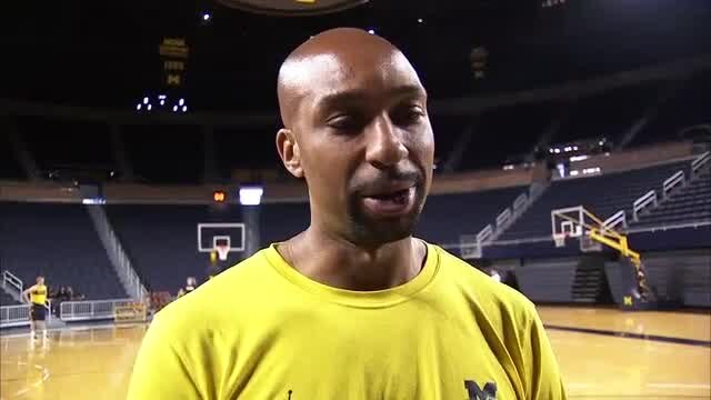 Saddi Washington talks to the media before Michigan heads to Spain