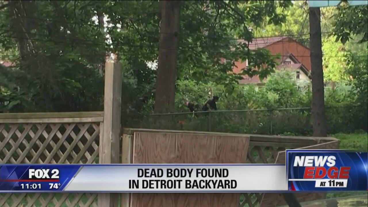Body discovered buried in Detroit backyard; 2 arrested