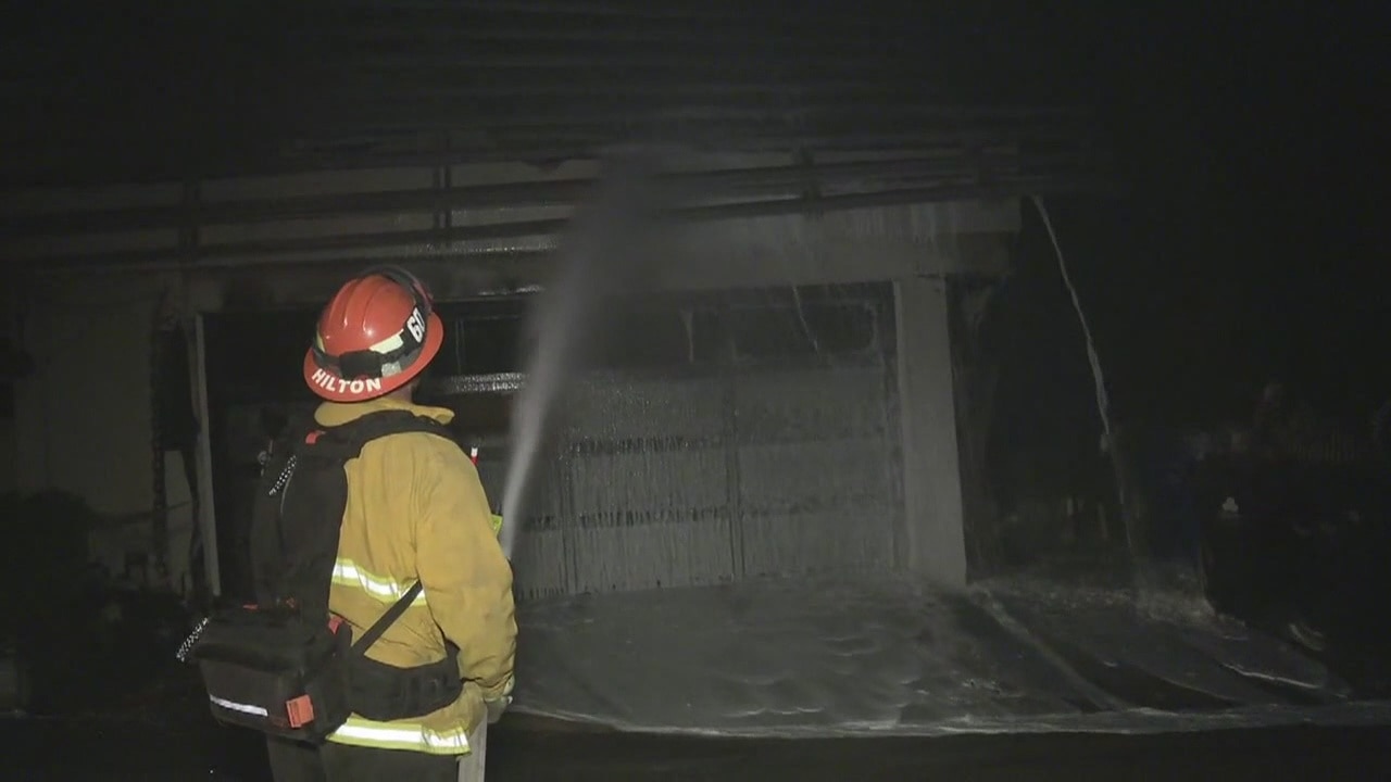 Large fire erupts near Getty Center destroying several homes