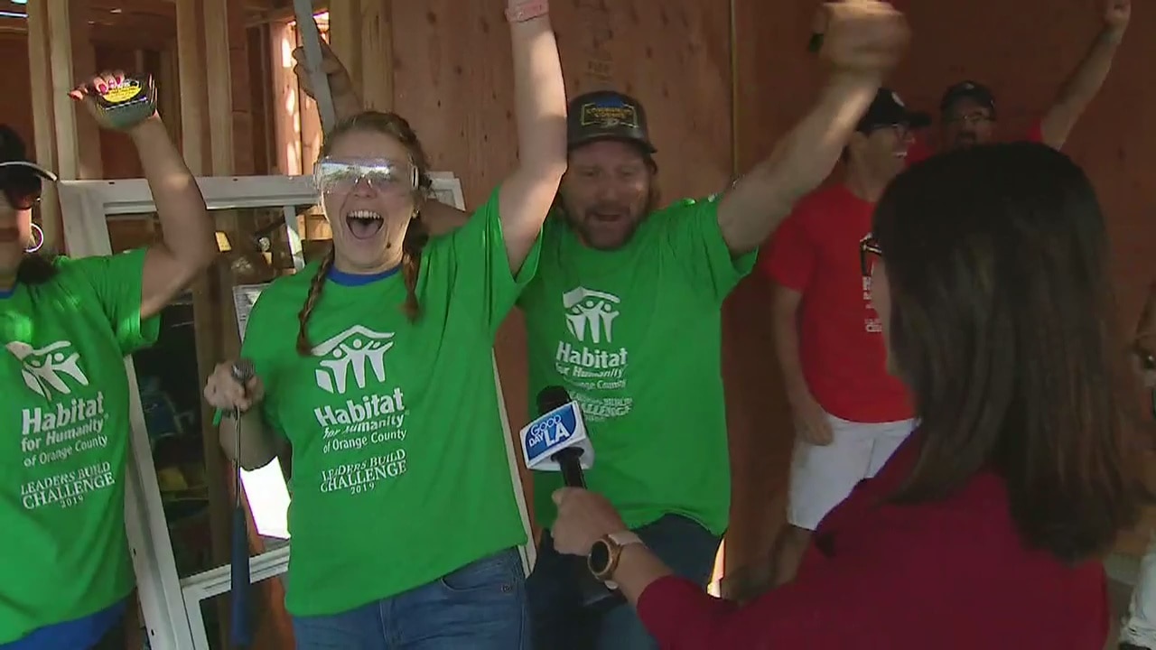 Volunteers help build affordable homes for local low-income families