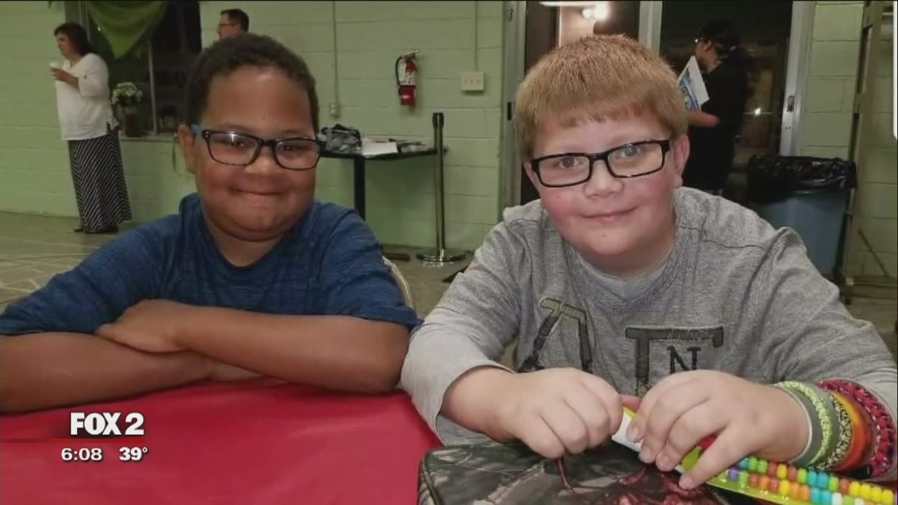 Boy gets headstone for family of best friend he lost to cancer
