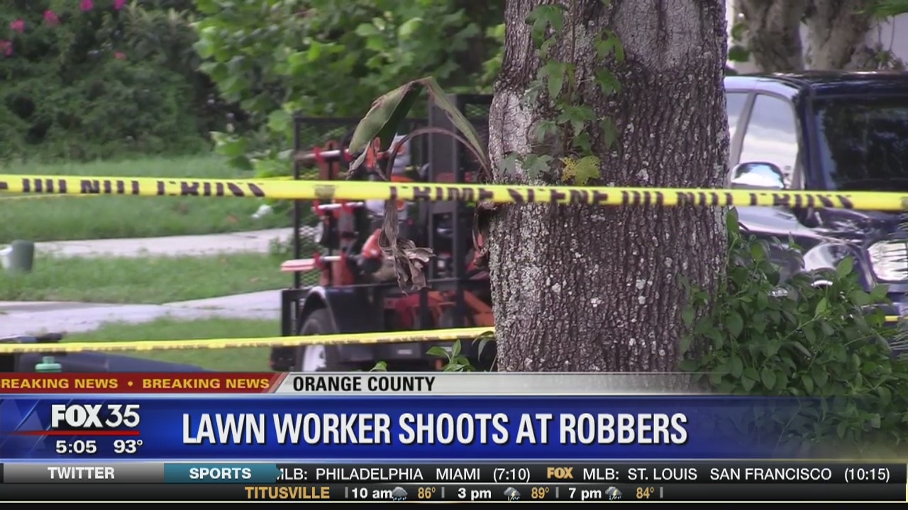 Lawn worker shoots at suspected robbers