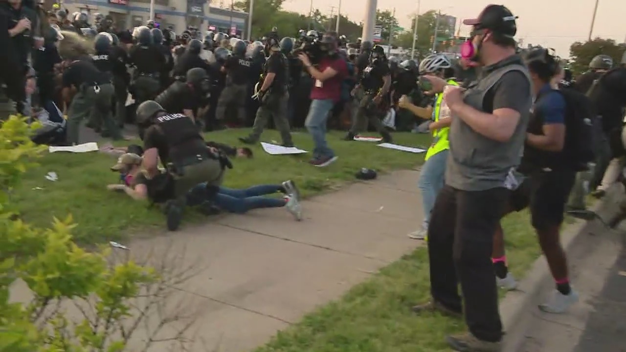 Tense police confrontation leads to arrest of demonstrators on east side of Detroit