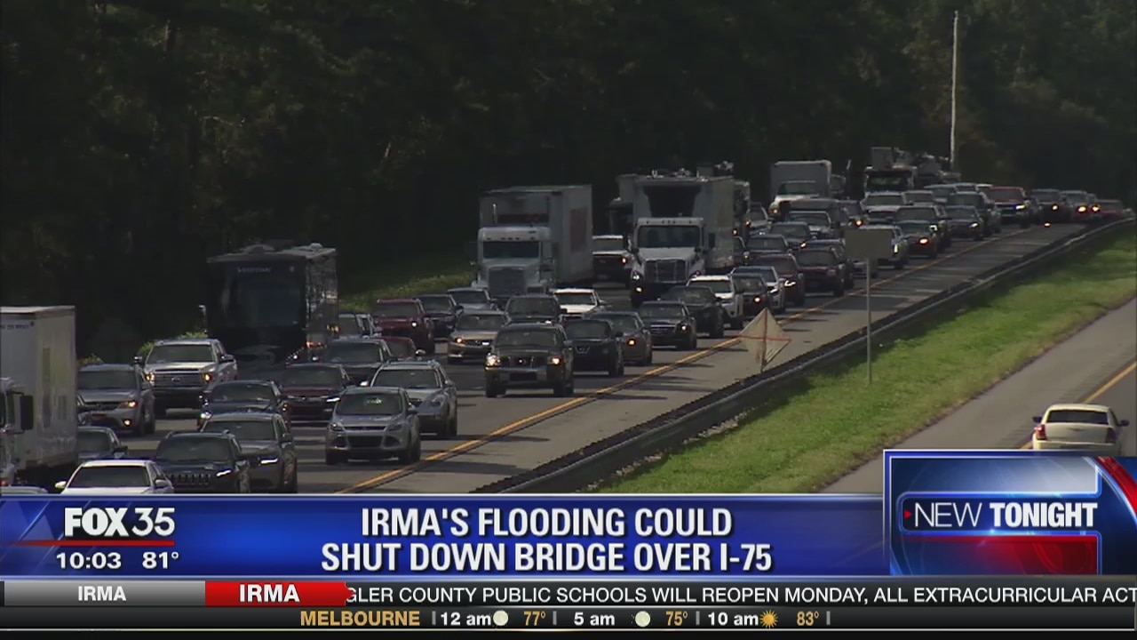 Rising river threatens to shut down I-75
