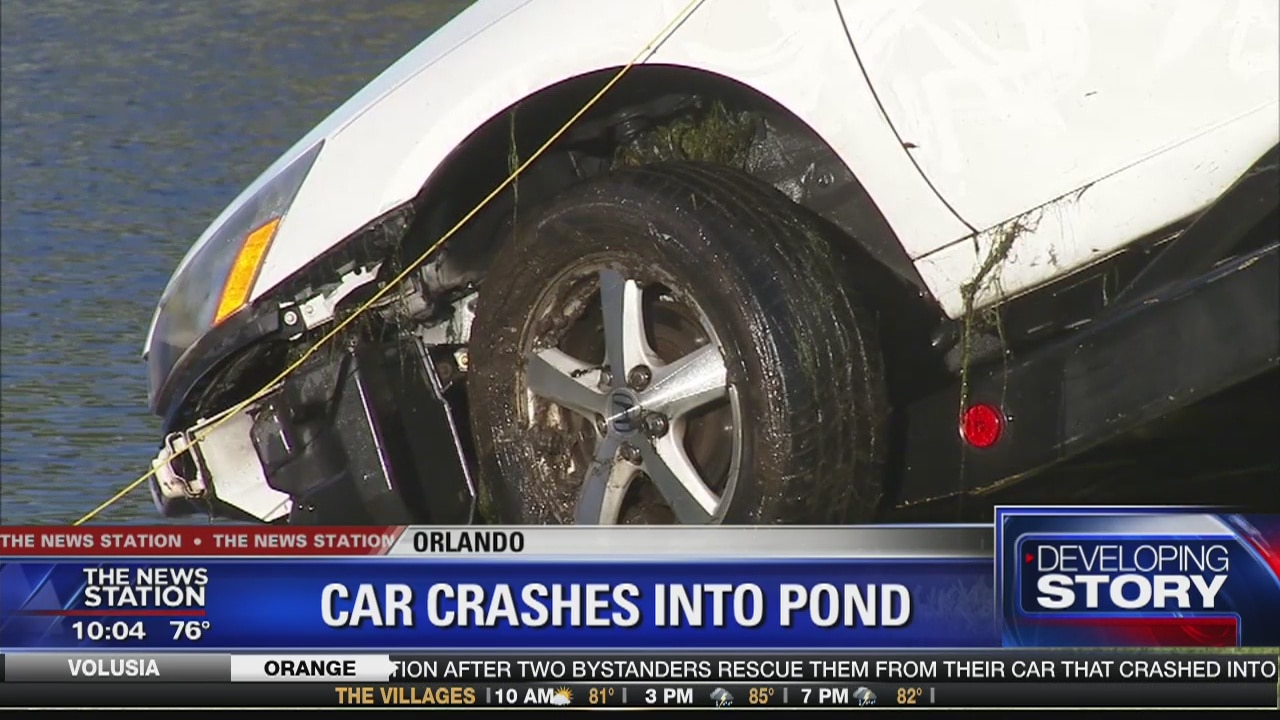 Car crashes into pond