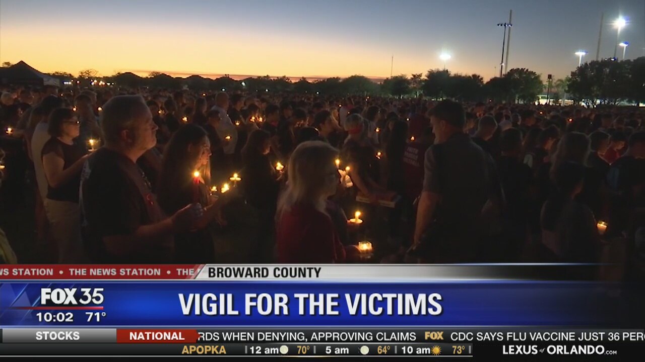 Hundreds hold vigil for victims of school shooting