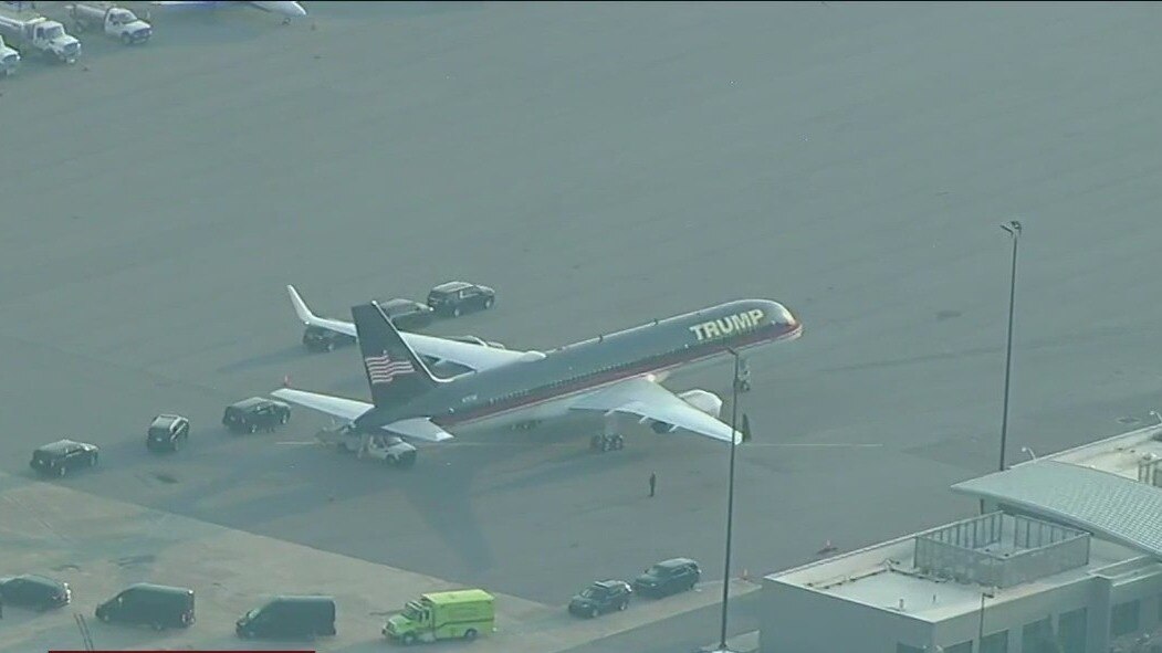 Trump arrives in Georgia to surrender