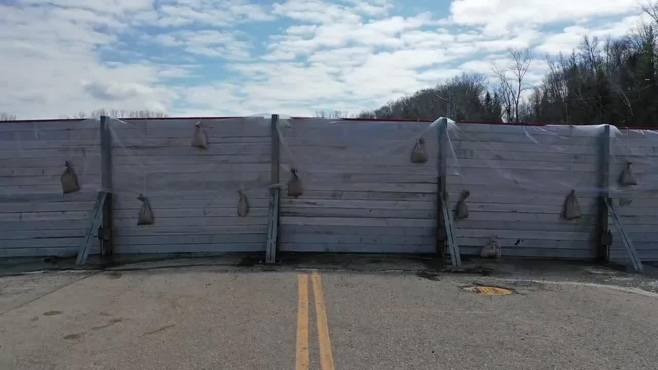 Flood wall protects city of Henderson from flood waters