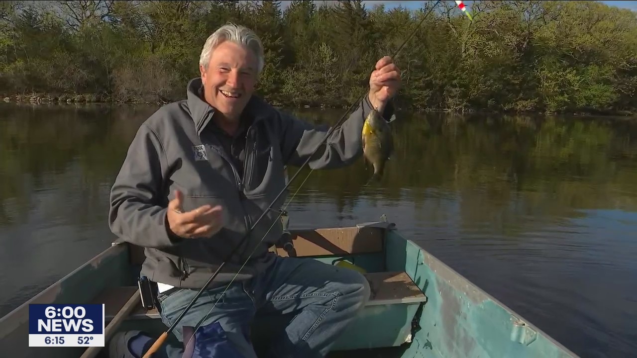 FOX 9's Jim Rich catches fish live on-air