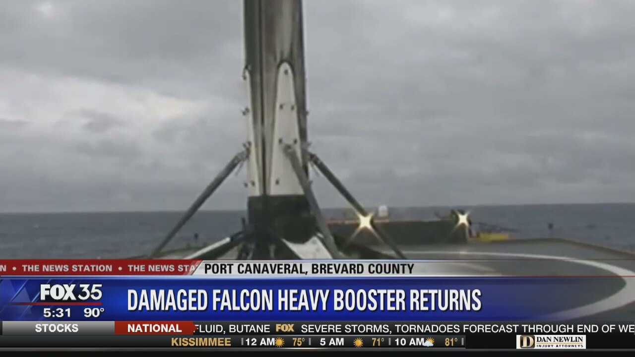 SpaceX Falcon Heavy damaged booster rocket returns